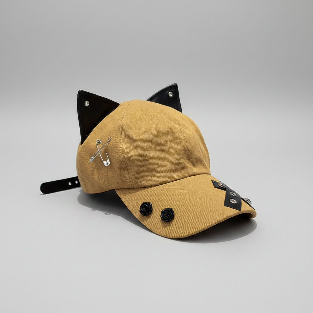 Yellow cap with black accents on a wooden surface